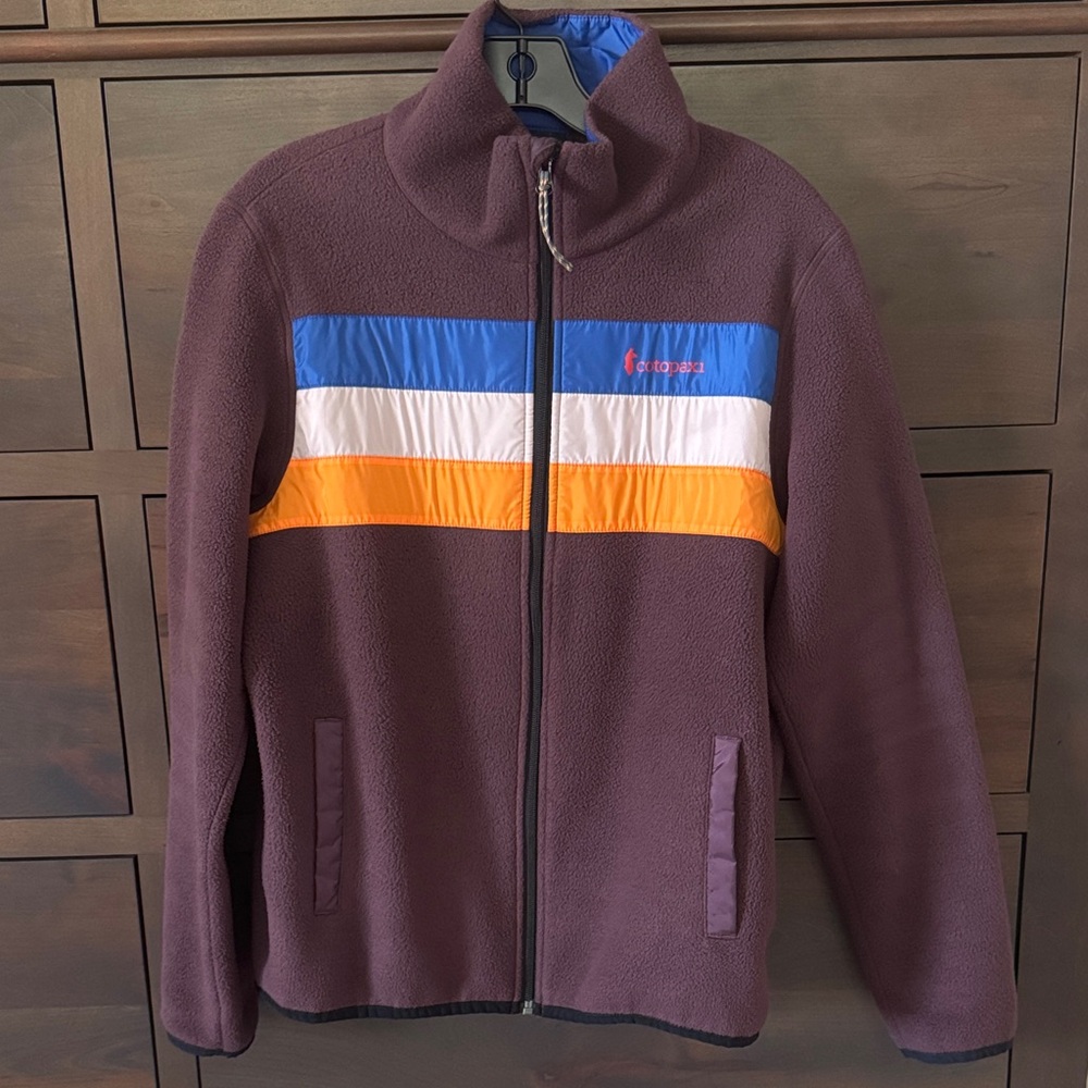 Cotopaxi Women's Burgundy Zip-Up Jacket with Blue, Pink, and Orange Stripes